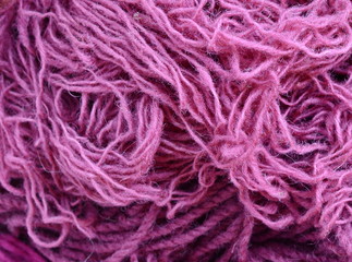 Color yarn for knitting, knitting wool balls . Beautiful yarn knitting background. Close up of multi colored kitting yarn.