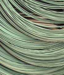 Industry wire roll up in storage. Construction Material - Roll of Metal Wire Strands/