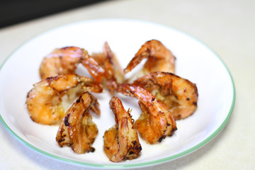 Delicious plate of shrimp cooked in butter and garlic.