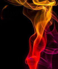 Obraz premium Colored smoke on black background