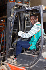 Portrait of afro warehouse worker