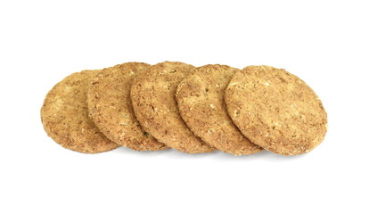 Round whole wheat biscuit, cookie with raisins isolated on white background. Biscuits with whole-wheat (wholemeal) flour isolated on white background 