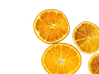Dried orange slices isolated on white background.