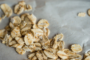  some oats scattered on aged paper