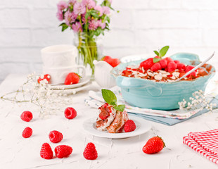 Traditional Italian Dessert with Raspberry Berries , cocoa, coffee and cheese masakropone. Tirmisu for homemade breakfast. Free space for text.