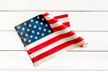 USA national day background with flag on white wooden desk top view