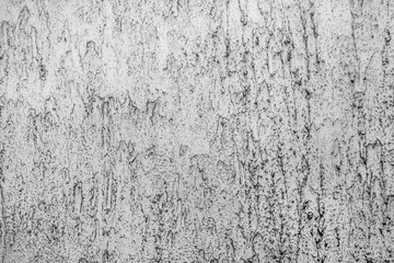 Texture of the decorative facade plasters. Aged cement wall. Wall cracks of the panel cement, on all background. Texture of fresh concrete wall on construction site. Copy space