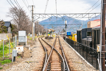 Fototapeta na wymiar Railway track switch near a small station