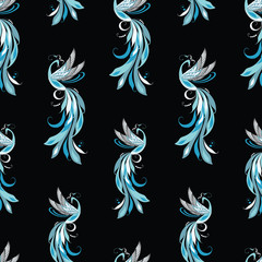 Fototapeta na wymiar Seamless pattern of blue fabulous birds