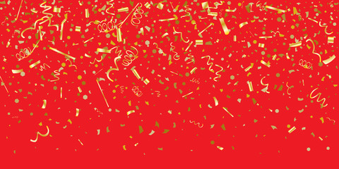 Golden glitter confetti on a red background. 