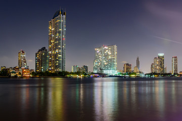 Obraz na płótnie Canvas Bangkok with skyscrapers at night