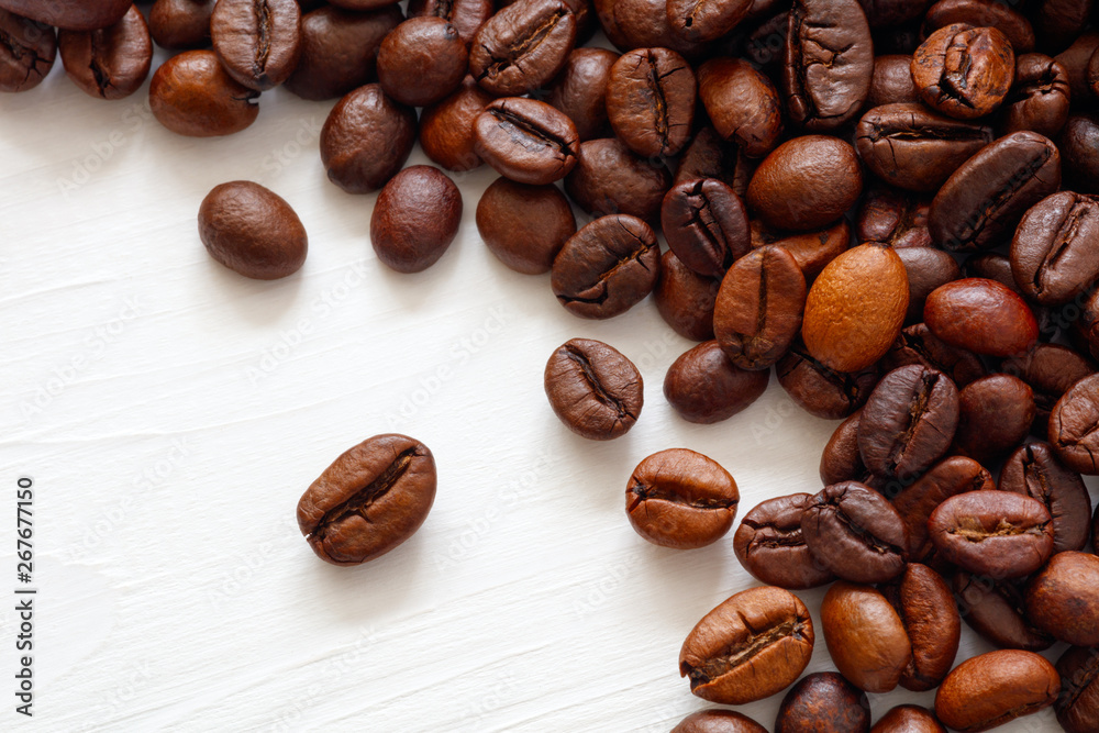 Poster Coffee  beans isolated on white background with copyspace for text. Coffee background or texture concept.