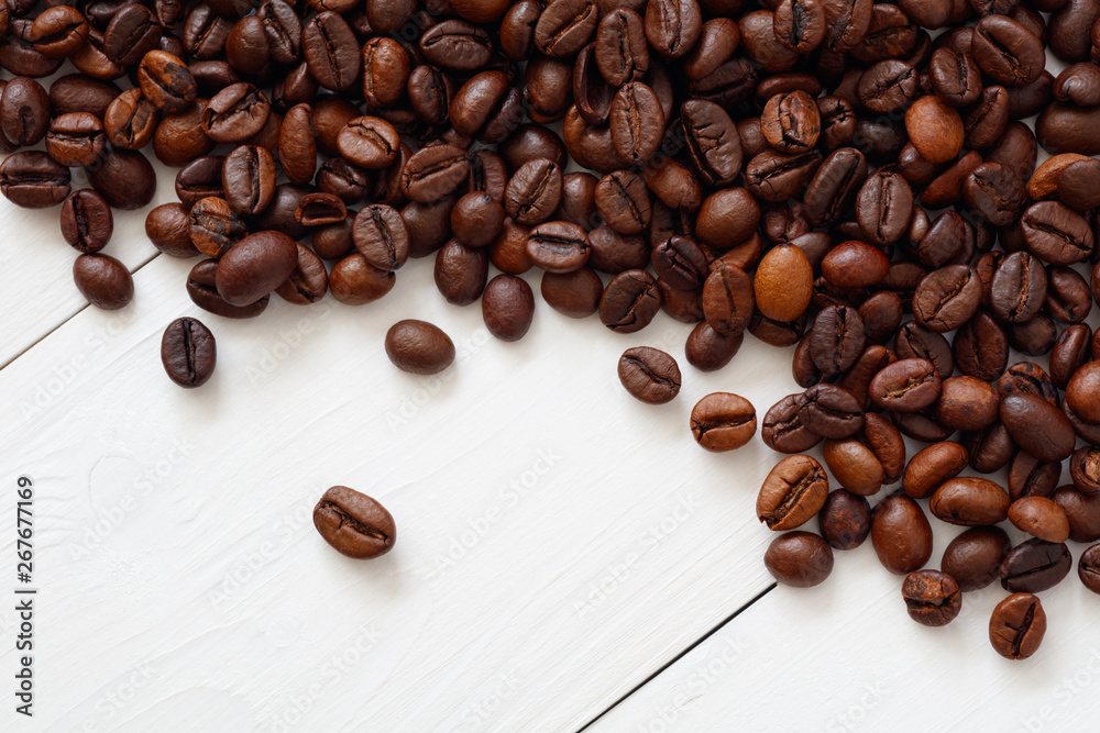 Poster Coffee  beans isolated on white background with copyspace for text. Coffee background or texture concept.