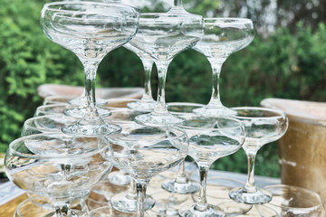 Pyramid of crystal glasses. Close-up