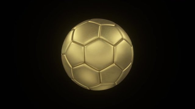3d render of a bronze ball. Rotating bronze soccer ball on black isolated background. Seamless loop animation