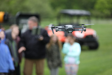 golf course superintendent demonstrates how drones are used to maintain a golf course