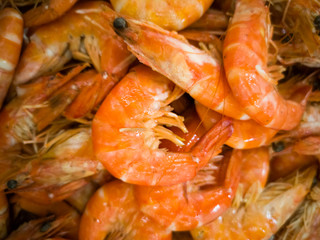 on the table a lot of cooked shrimp