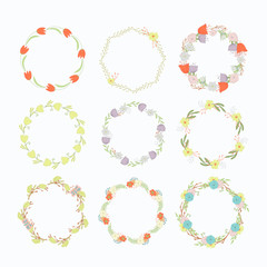 Wreath with leaves and flowers isolated on a white background.