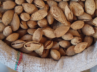 Fresh almond nuts at a food market