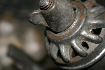 Old rusty cast iron meat grinder close up.JPG