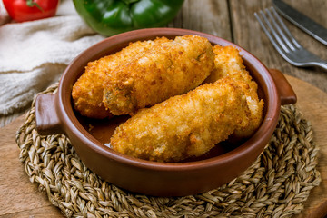 mushroom croquettes with tomato sauce