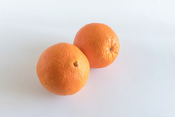 Fresh and delicious oranges isolated on white background
