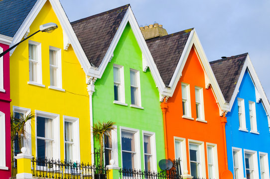 Row of brightly painted multicoloured houses in Whitehead