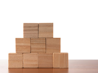 Block wooden cubes on the office desk