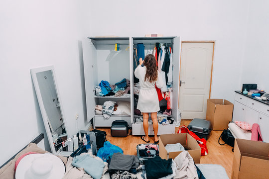 Nice-looking lady inside modern apartment room prepare to trip
