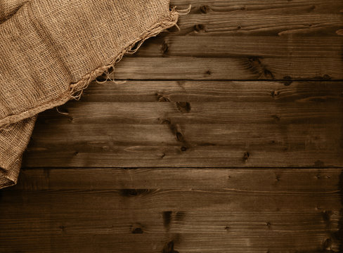 Burlap Fabric Cloth On Brown Wooden Kitchen Table With Copyspace