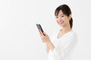 Fototapeta premium 女性 スマートフォン