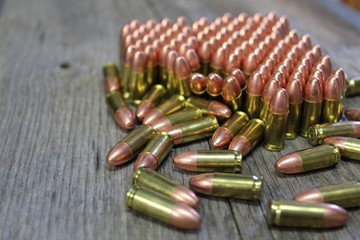 9mm bullets on barn wood