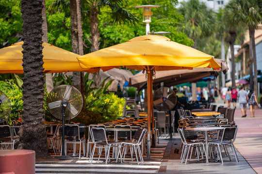Miami Beach Lincoln Road restaurant tables and umbrellas