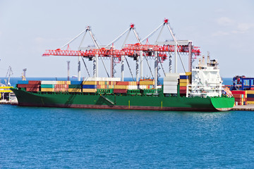 Container ship harbor crane. Odessa sea commercial port