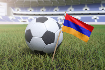 Armenian flag in stadium field with soccer football