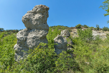 Fototapeta na wymiar Summer landscape of Rock formation The Stone Dolls of Kuklica near town of Kratovo, Republic of North Macedonia