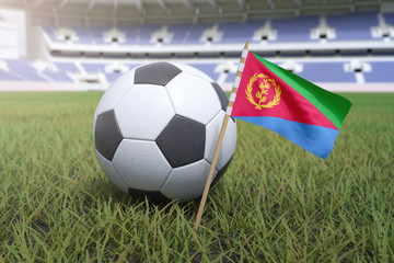 Eritrean flag in stadium field with soccer football