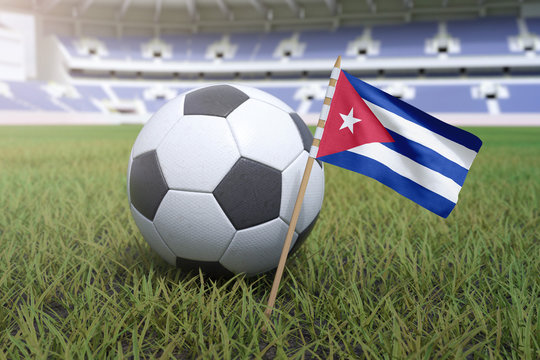 Cuban flag in stadium field with soccer football