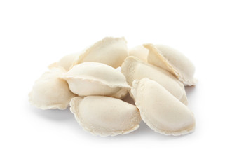 Heap of raw dumplings on white background