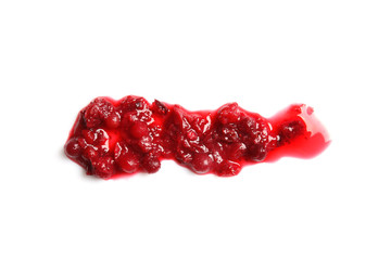 Spilled cranberry sauce on white background, top view