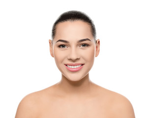 Obraz premium Portrait of young woman with beautiful face and natural makeup on white background