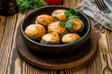 mushrooms baked with Suluguni cheese