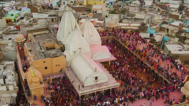 Color battle at the holi festival in India, 4k aerial shot