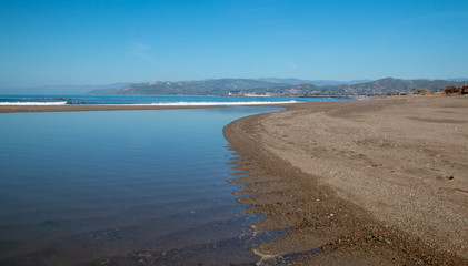 Sandbar where the Pacific ocean and the Santa Clara river meet at Surfers Knoll beach in Ventura California United States