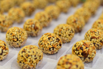 sweet with peanuts, brazilian sweet , chocolate candy, party candy, condensed milk candy balls, chocolate truffles, brigadeiro, chocolate sprinkles, chocolate candy, sweets table