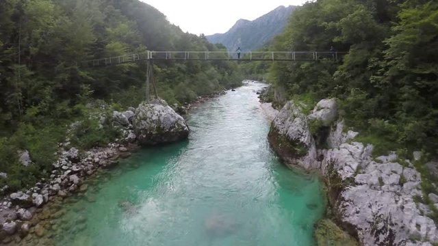 GoPro Karma dron shot of small bridge on river Soča