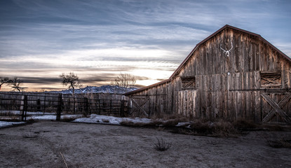 Rustic Old Barn in Prairie During Sunset
