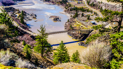 View of The Old Bridge, a single lane bridge over the Fraser River at the town just north of the town of Lillooet, British Columbia, Canada