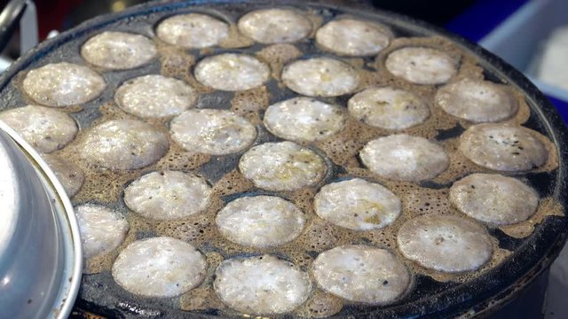 khanom khrok, Knmcrk, Thai sweetmeat, made from coconut milk with sugar and flour