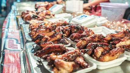 Close up focus chicken grilled in asian night market